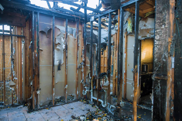 Professional Fire Damage Restoration technician working in Angola, NY